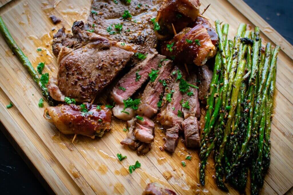Asparagus and steak on the board