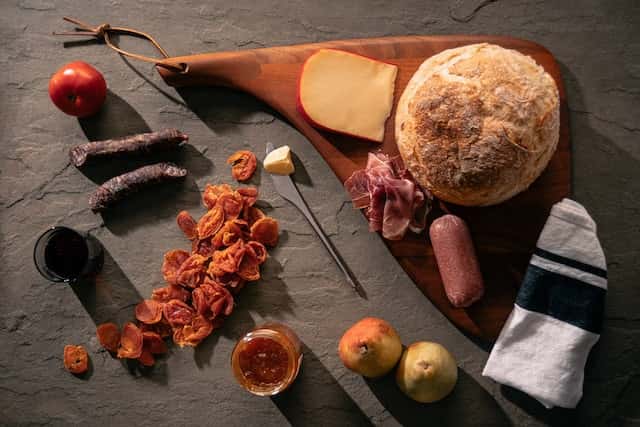 Dry apricots, cured meats and cheese board