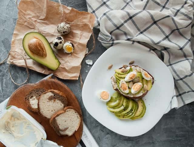 avocado, quail egg and toast for breakfast