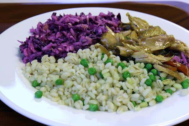 barley dish with artichokes and purple cabbage