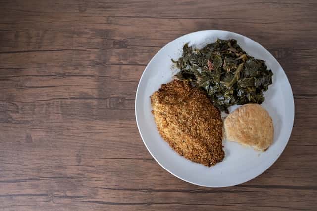 breaded catfish, collard greens and biscuit