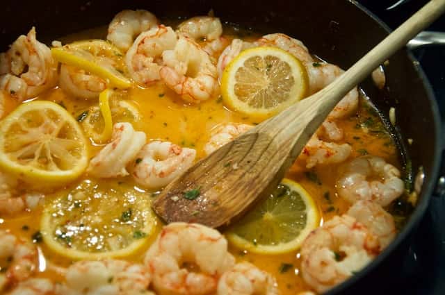 butter and prawns sauce with herbs and lemon