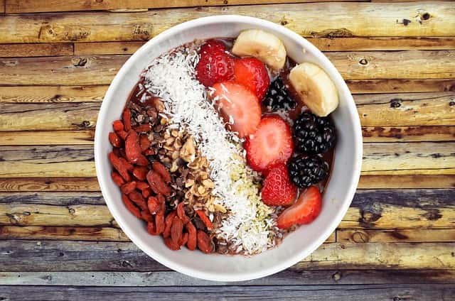 flaxseeds, fresh and dry fruits breakfast bowl