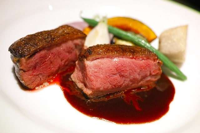 crispy duck breast, vegetables and red wine jus