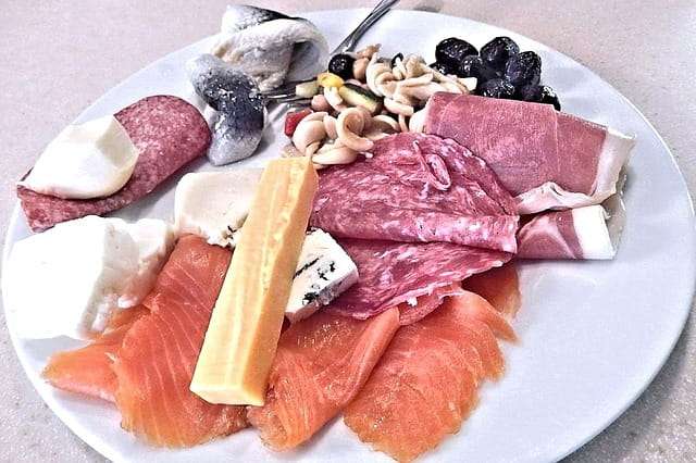 gouda cheese, slice cured meats and fish plater