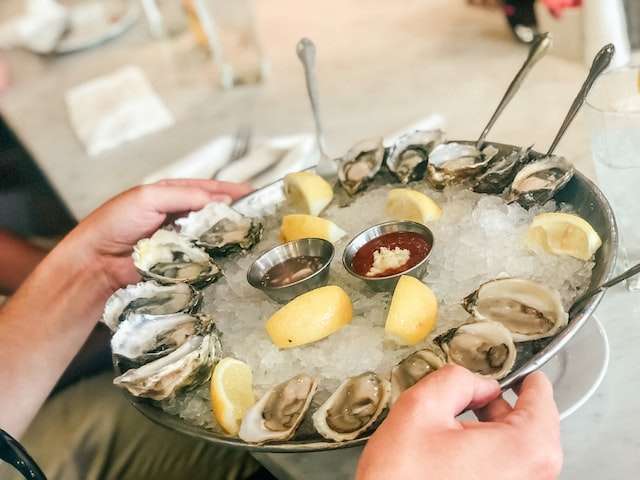 Horseradish sauce and oysters plater