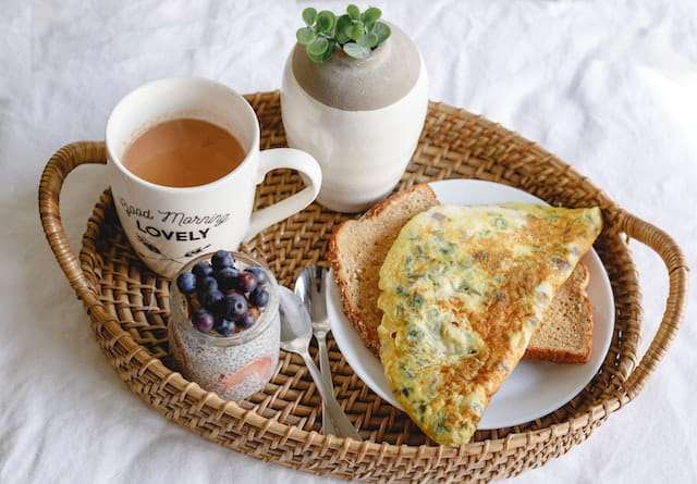 chia pudding, egg omelette and toast breakfast