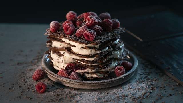 cream, chocolate layers and raspberry dessert