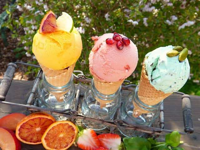 orange ice cream and multiple other ice creams