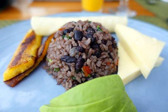 fried plantain and mix beans and rice dish