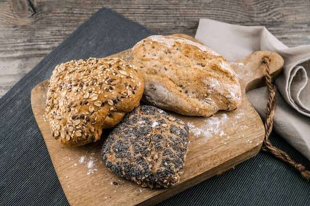 Artisan breads covered with poppy seeds and different seeds
