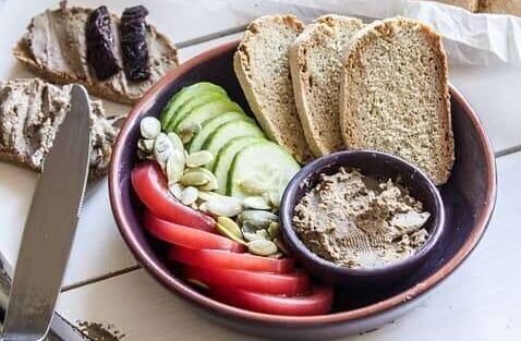 Homemade rye bread with pate and vegetables