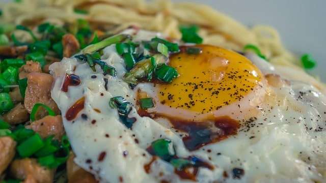 Fried egg topped up with scallions