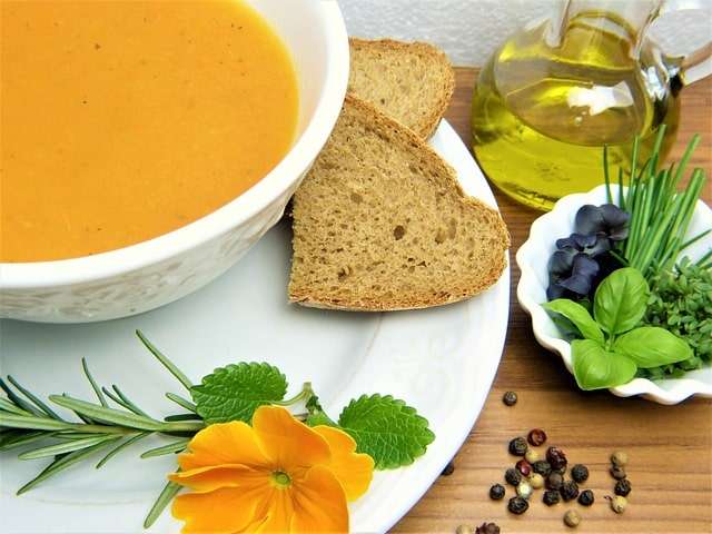 spelt bread slice and carrots soup