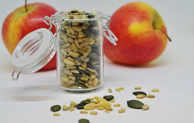 Sunflower and pumpkin seeds with apples as snack