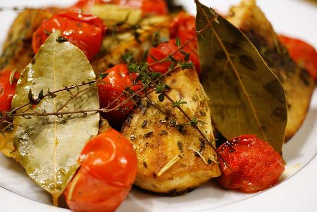 Roast swordfish with potato, tomato and herbs
