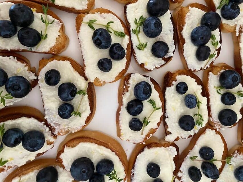 Thyme, cream cheese and blueberry crostini