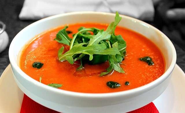 Tomato soup with basil oil and rocket